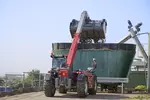 Weidemann telehandler T7042 with power grab bucket, application