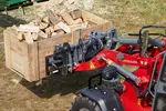 Weidemann attachment Pallet fork with hydraulically adjustable tines and side shift in action forestry industry, Hoftrac 1390