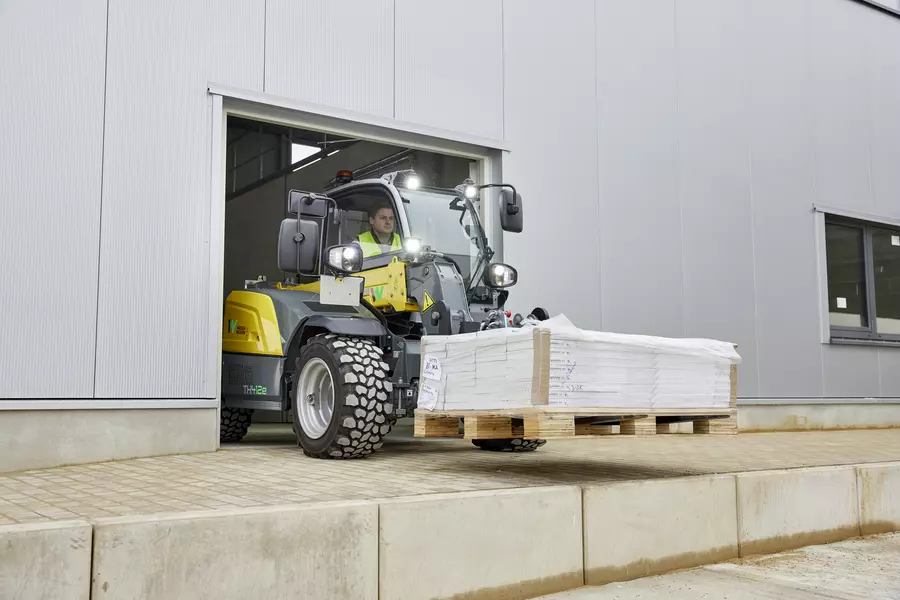 Wacker Neuson TH412e telehandler in use on a construction site