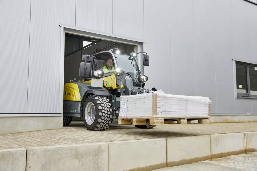 Wacker Neuson TH412e telehandler in use on a construction site