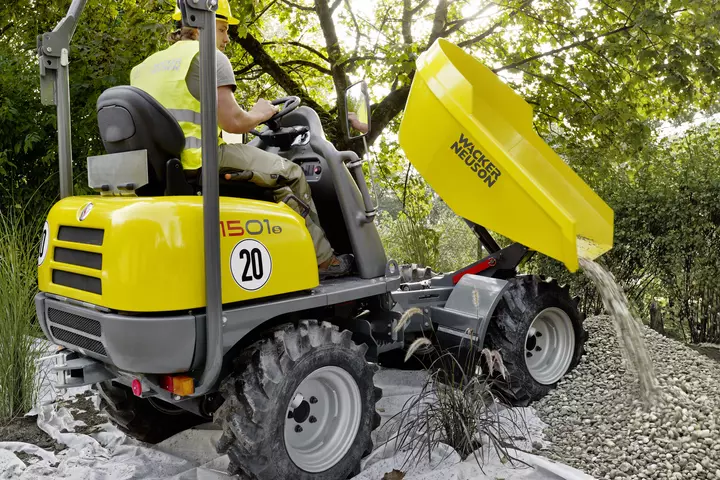 Wheel Dumper 1501s unloading rubble with the tilting skip in the area
