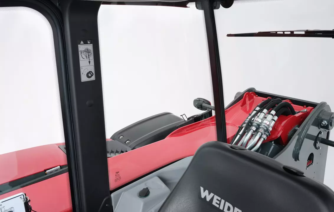 Weidemann telehandler T7035 cabin with look to the right, studio