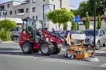 Weidemann Hoftrac 1190e Kabine mit Kehrmaschine, Einsatz