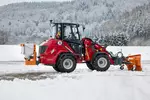 Weidemann attachment Small spreader, in action municipality, Hoftrac 1390