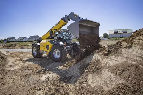 The Kramer telehandler 3610 while working with soil. 