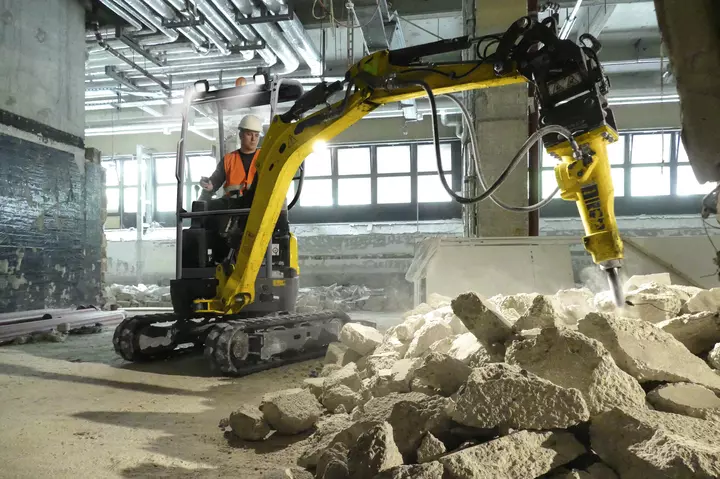 Demolition work with a hydraulic hammer on the EZ17e indoors