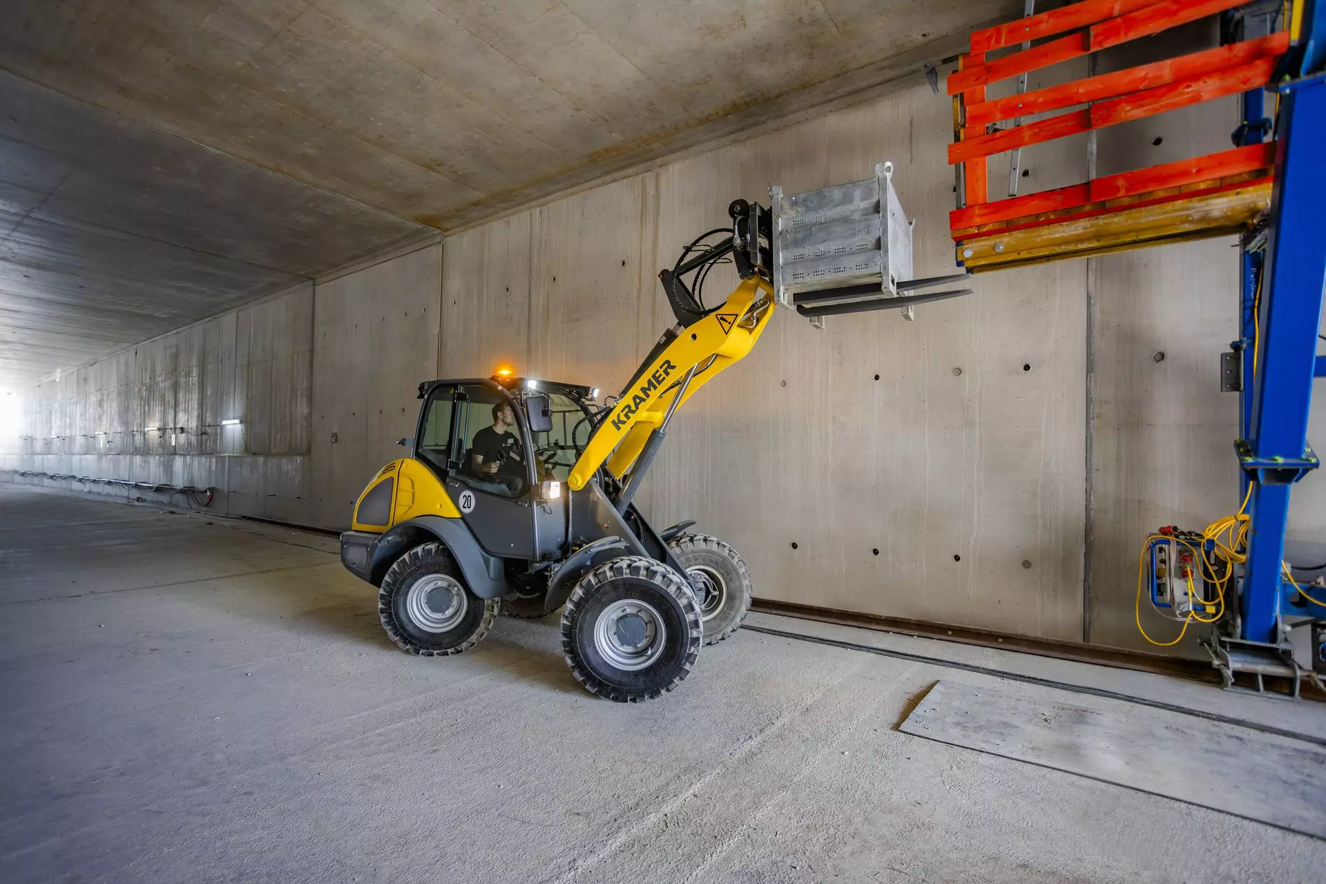 The Kramer wheel loader 5085 while lifting material.