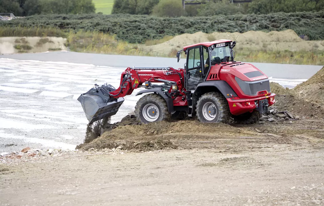 Weidemann telescopic wheel loader 9580T cabin with digging bucket, application