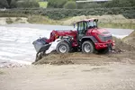 Weidemann telescopic wheel loader 9580T cabin with digging bucket, application
