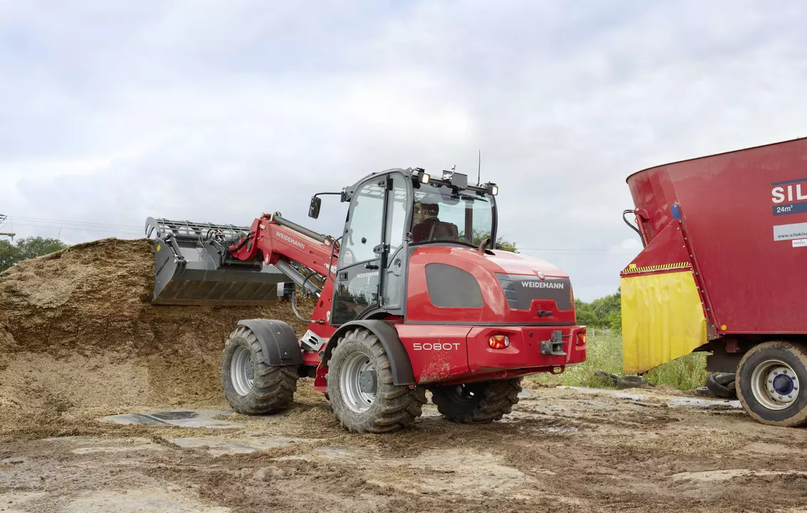 Weidemann telescopic wheel loader 5080T cabin with power grab bucket, application