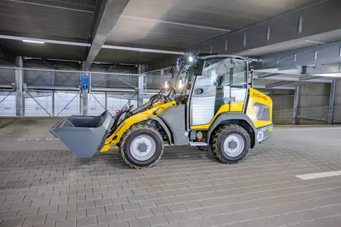 The 5045 wheel loader moves through the underground car park.