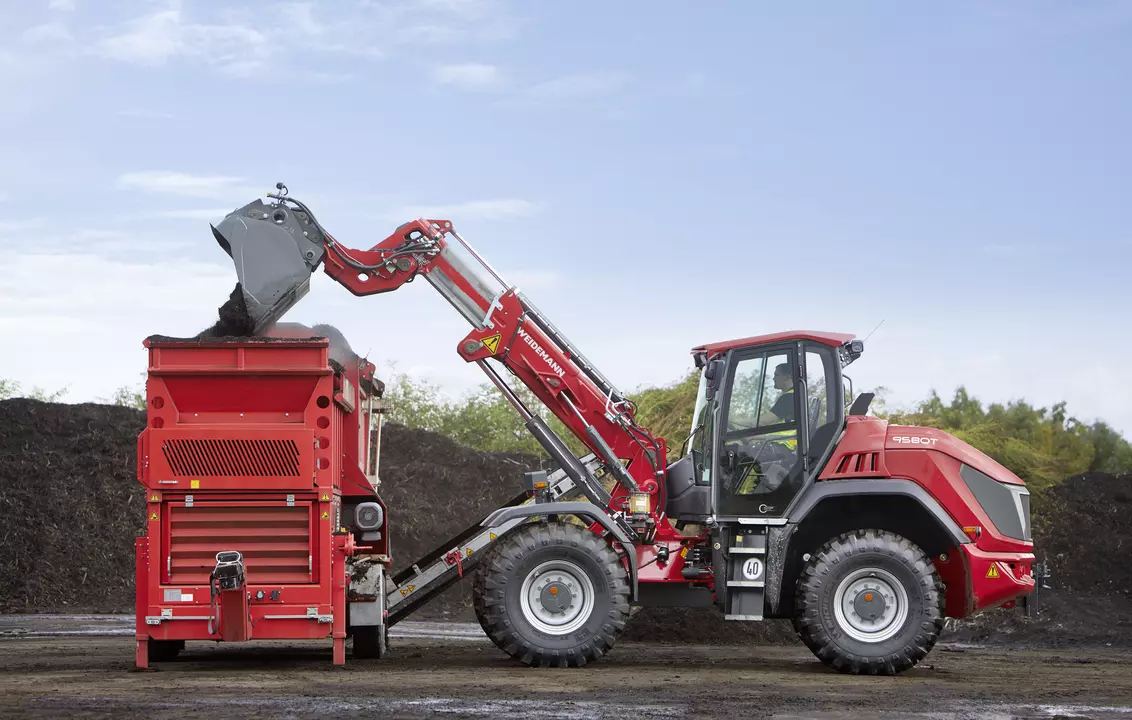 Weidemann telescopic wheel loader 9580T cabin with digging bucket, application