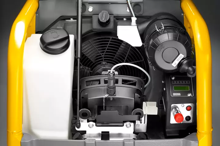 Remote-controlled vibratory plate DPU110r studio image engine cormpartment with tank and air cleaner