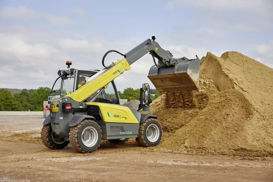 Wacker Neuson TH412e telehandler in use on a construction site