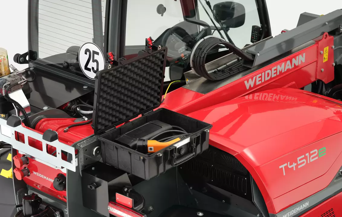 Weidemann telehandler T4512e charging cable storage, studio
