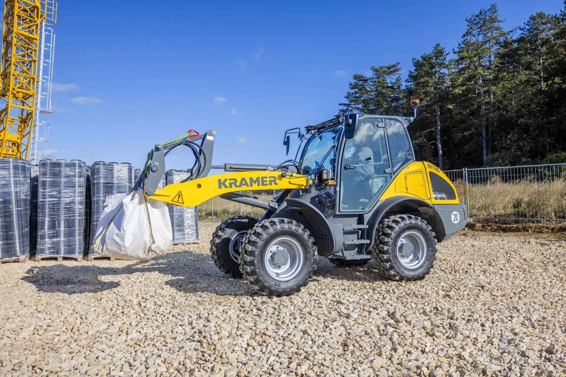 The Kramer wheel loader 8115 while transporting a big bag.