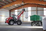 Weidemann attachment Pallet fork, in action agriculture, Wheel loader 9080