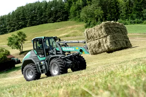 The Kramer wheel loader KL70.8 and KL70.8L while working on a farm.