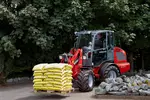 Weidemann attachment Pallet fork, in action municipality, Wheel loader 2080