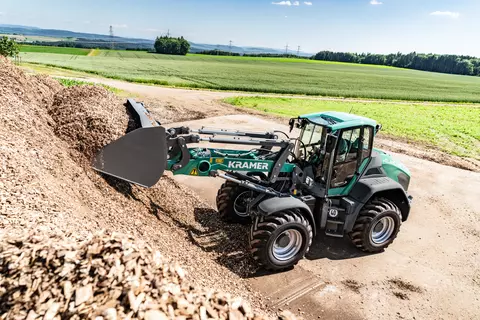 The Kramer wheel loader KL60.8 while working in agriculture. 