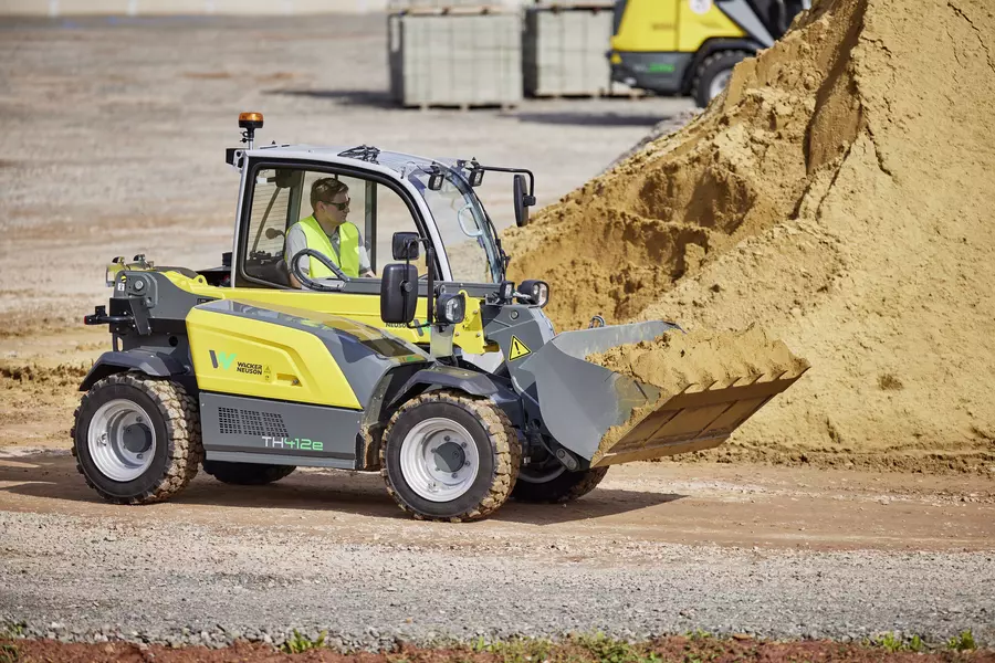 Wacker Neuson TH412e telehandler in use on a construction site