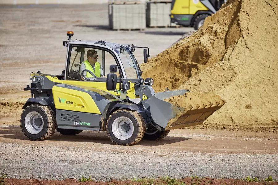 Wacker Neuson TH412e telehandler in use on a construction site