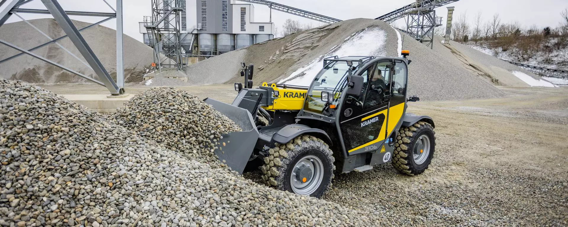 The Kramer 3106 telehandler loading gravel.