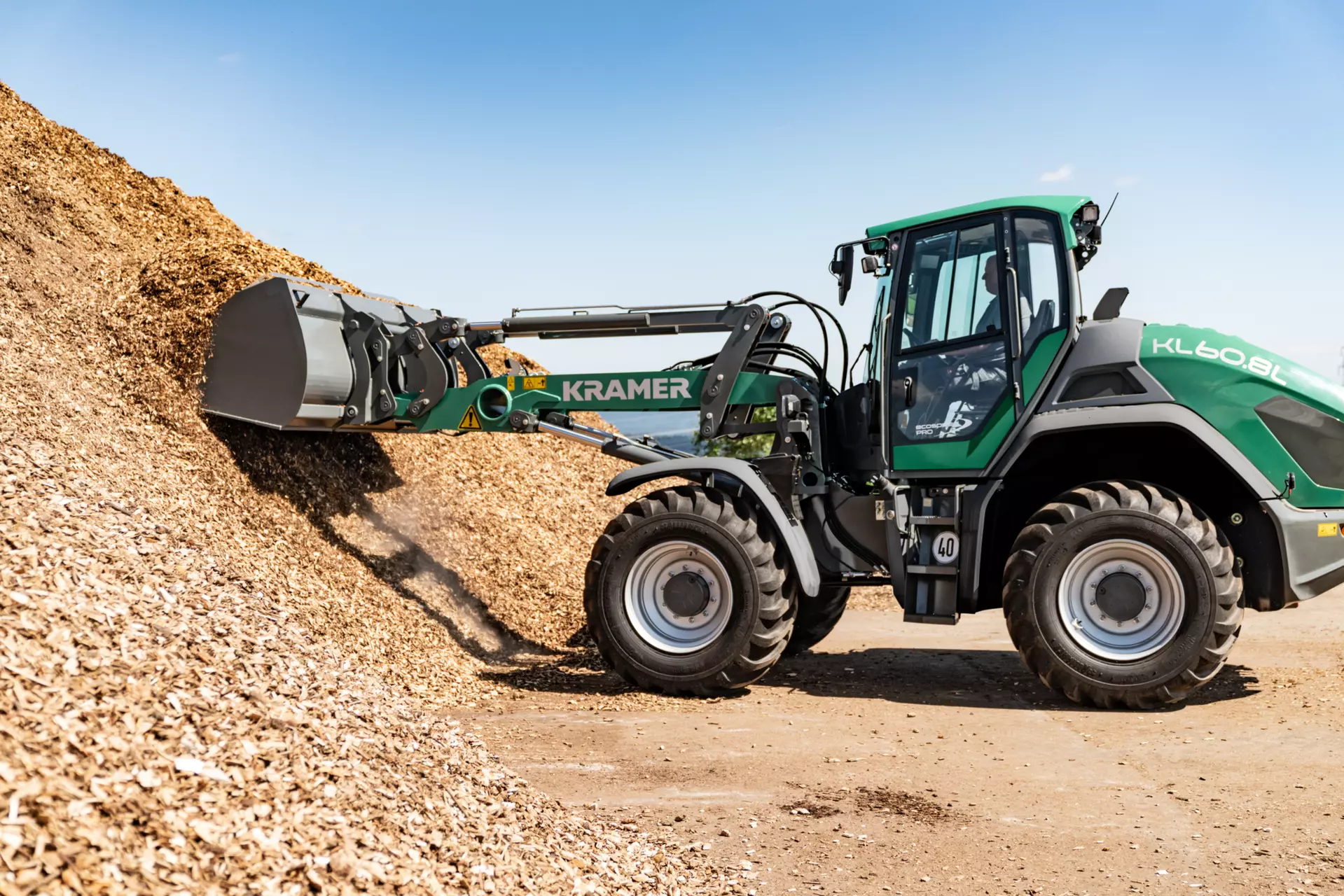 The Kramer wheel loader KL60.8 while working in agriculture. 