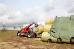 Weidemann attachment Round bale fork for wrapped bales, in action agriculture, Telehandler T6027