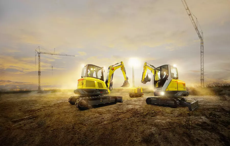 ET42 and EZ50 on a construction site with cranes (image boost)