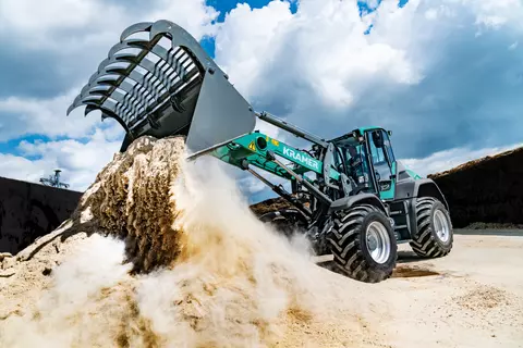 The Kramer wheel loader KL60.8 while working in agriculture. 