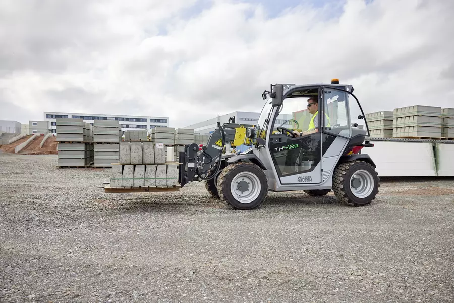 Wacker Neuson TH412e telehandler in use on a construction site