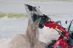 Weidemann attachment earth bucket ripper teeth, in action 
