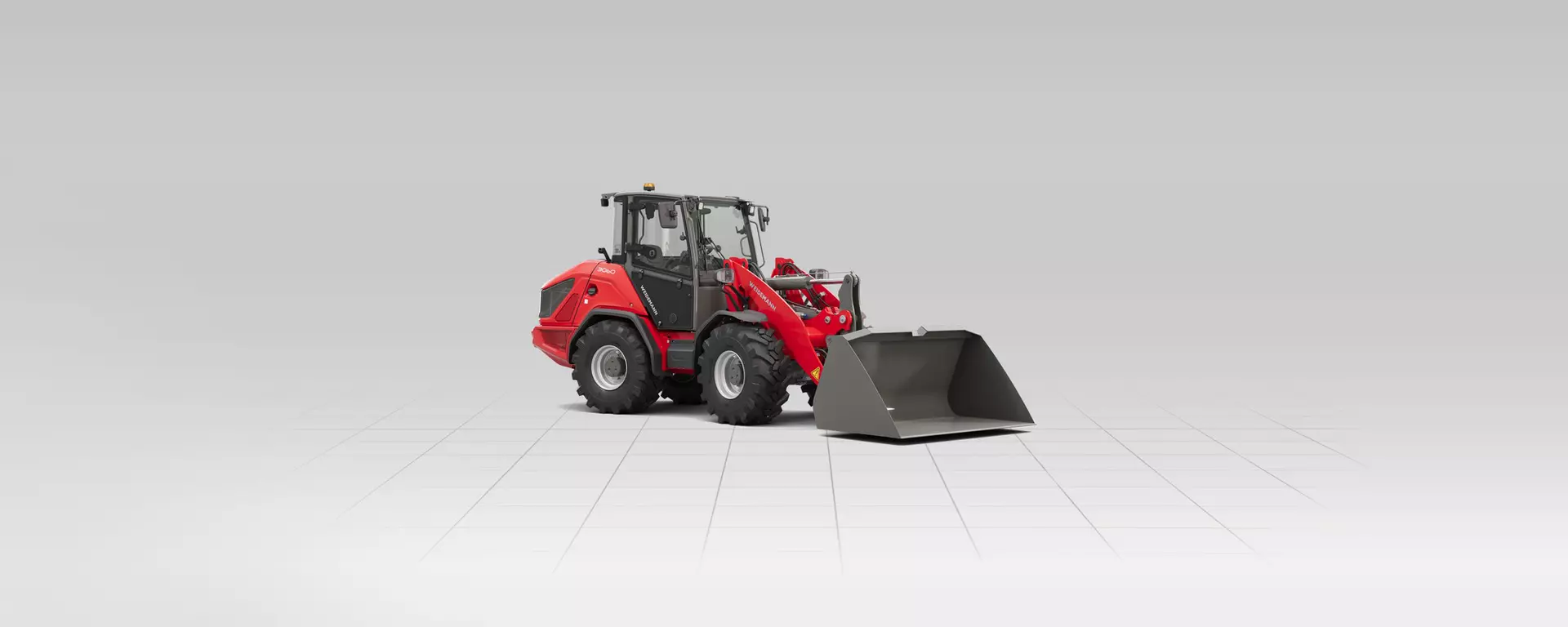 Weidemann Radlader 3060 mit Leichtgutschaufel im Studio