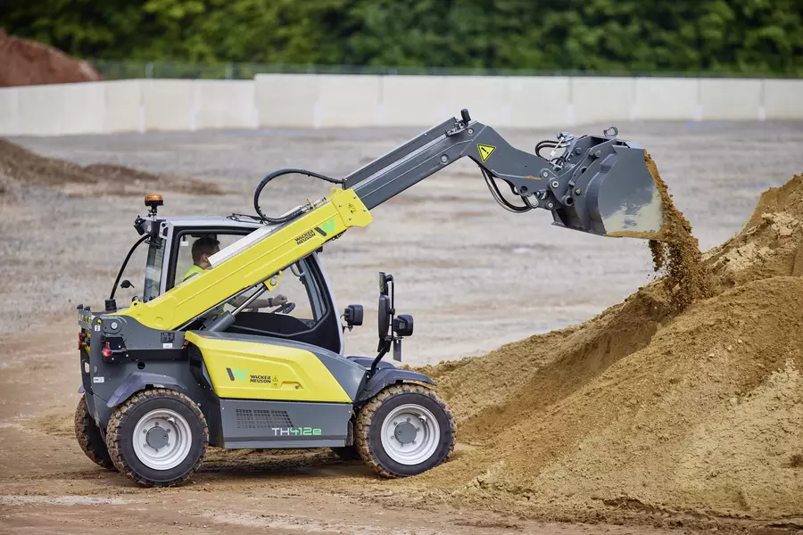 Wacker Neuson TH412e telehandler in use on a construction site