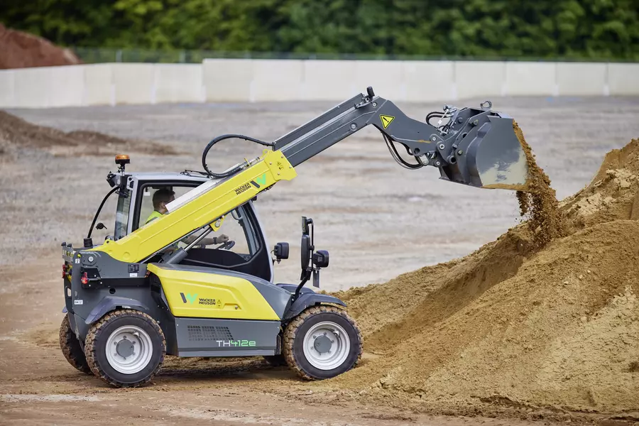 Wacker Neuson TH412e telehandler in use on a construction site