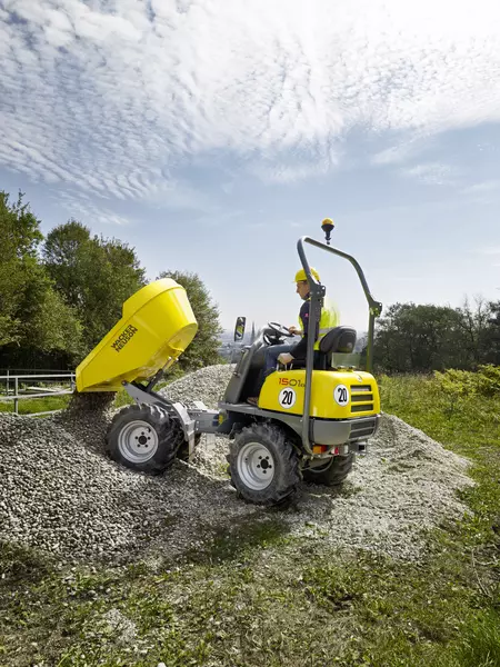 Wheel dumper 1501s unloading ballast on a construction site in the area