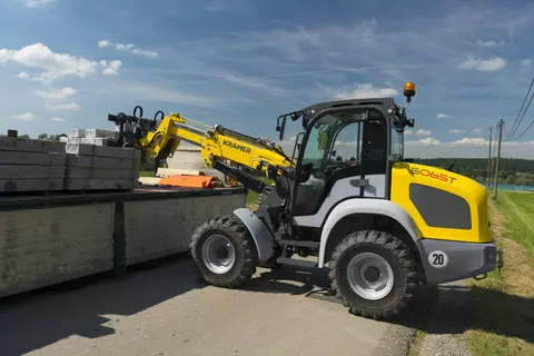 Der Kramer Teleskopradlader 5065T beim Verladen von Steinen