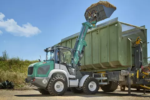 The Kramer telescopic wheel loader KL25.5T while loading a container. 