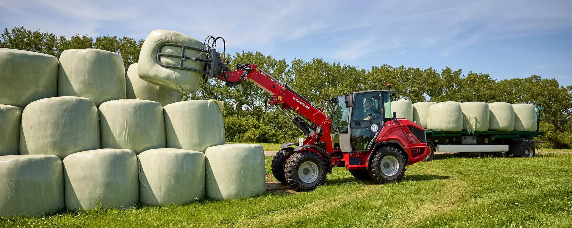 Weidemann Teleskopradlader 2060T Kabine mit Rundballenzange, Einsatz